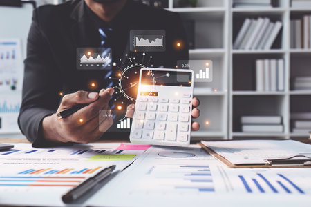 Business people using AI to help and analysis and research finance data. Artificial Intelligence, Futuristic technology transformation conceptの写真素材