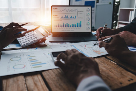 Group of Business People Meeting analysis financial plan, discussion, research with paperwork at office, accounting conceptの写真素材