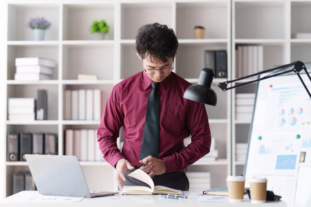 Accountant man working with calculator and do document, tax, exchange, accounting and Financial advisor conceptの写真素材