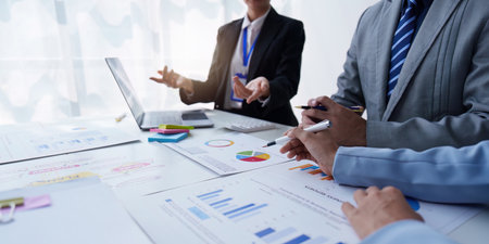 Group of Business people using AI to help and analysis and research finance data. Artificial...