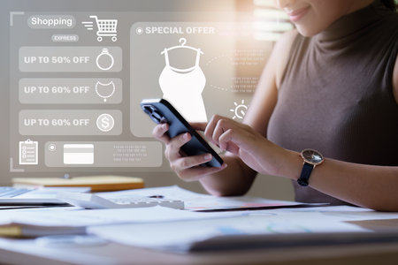 Online store icon, shopping on internet, Asian woman using on virtual screen with hands choosing on smartphone applicationの写真素材