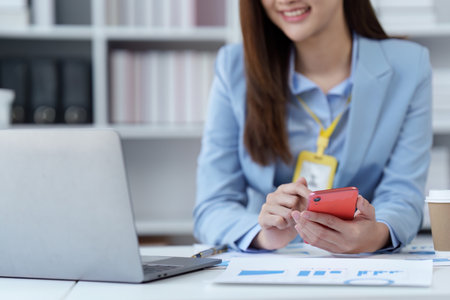 Beautiful Businesswoman completes KYC using an online banking program in order to open a digital savings account. The definition of cyber securityの写真素材