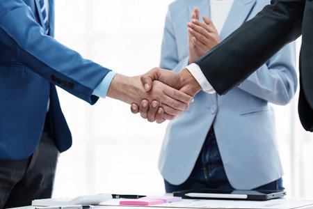 Business partnership meeting concept. Image business people handshake. Successful businessmen handshaking after good deal. Group support conceptの写真素材