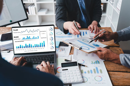 Group of Business People Meeting analysis financial plan, discussion, research with paperwork at office, accounting conceptの写真素材