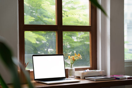 Laptop computer with white background on table. technology conceptの写真素材