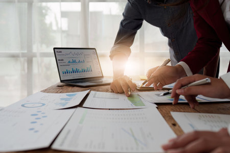 Close up Business team of financial analyze about companys graph profit. finance, strategy, meeting conceptの写真素材