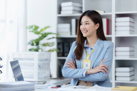 Accountant woman working on laptop and do document, tax, exchange, research, accounting and Financial advisor conceptの写真素材