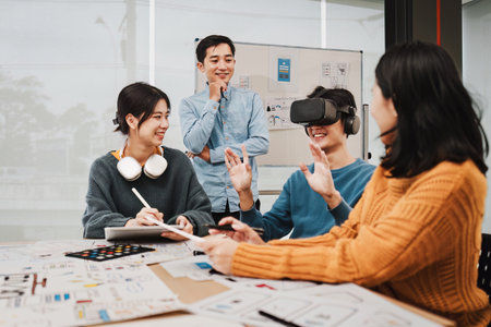 Team of ux developer and ui designer brainstorming interface wireframe design.Creative digital development agencyの写真素材