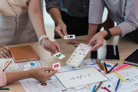 Close up of developer and ui designer brainstorming interface wireframe design.Creative digital development agencyの写真素材