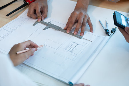 Group of engineer is discussion and brainstorming about condominium model of construction project