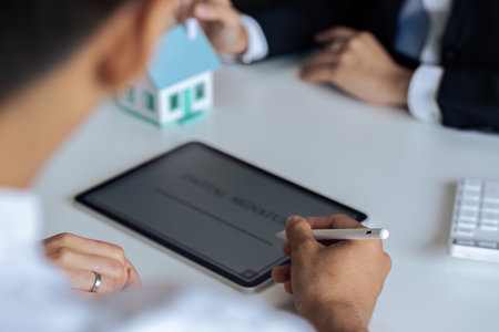 young man sign purchase contract using online signature. Sign on tabletの写真素材