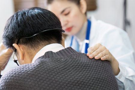 Hands of medical personnel comforting to reassure the patient in clinic, Healthcare and medical conceptの写真素材