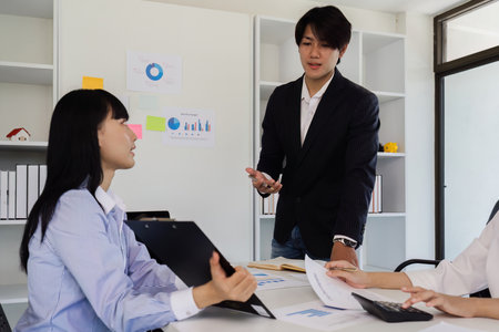 Diverse startup young people and partnership brainstorm while meeting project at meeting roomの写真素材