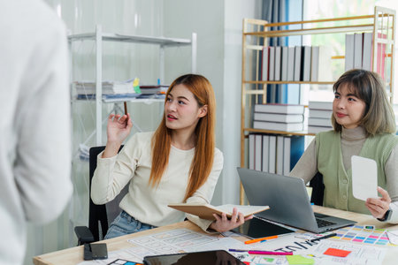 UI designer and UX developer brainstorm idea to design the application appearance in the early stage. Creative digital development agency. UX UI conceptの写真素材