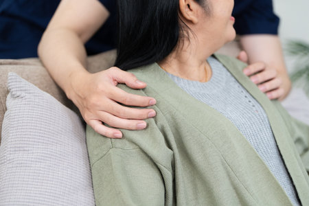 Empathy, trust and nurse caregiver holding hands with patient. consulting support and healthcare adviceの写真素材