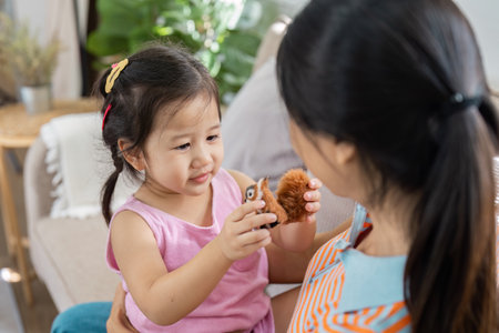 Mother and Daughter Bonding at Home with Toy, Happy Family Time, Parenting and Childhood Moments