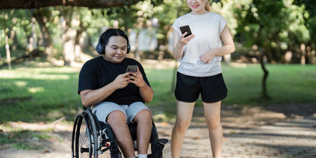 Inclusive Outdoor Activity with Friends Using Smartphones in a Park Setting on a Sunny Day