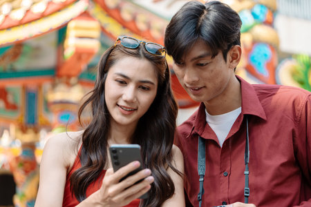 Joyful Traveler Celebrating Chinese New Year at Vibrant Festive Destination with Traditional...