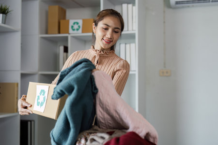 Volunteers Organizing Donations at Food Banks and Community Centers for Charitable Support and Assistanceの写真素材