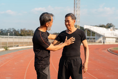 Wellness and camaraderie among seniors embracing healthy living through support.の写真素材