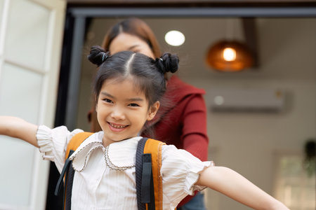 Adventure and Milestones. A child joyfully walks out into the world for her first day of school.