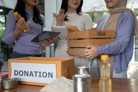 Empowerment and Sustainability. Women participating in a donation drive to foster community...