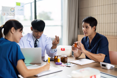 Team Doctor and Meeting. A healthcare team discussing patient care strategies and medication management during a collaborative meeting.の写真素材