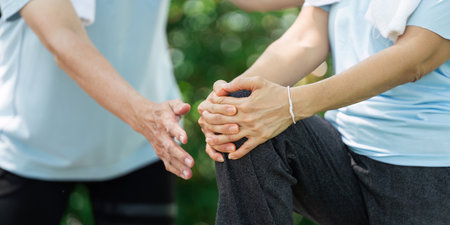 Wellness and Senior Care. A senior receiving guidance during a gentle exercise session.の写真素材