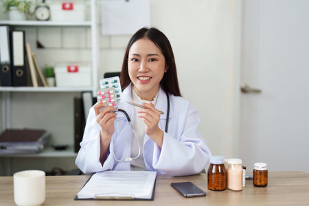 Healthcare provider discusses medication options with patientの写真素材