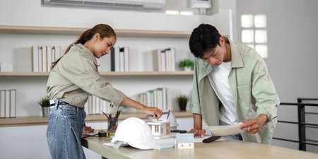 Architects Collaborating on Sustainable Design Projectsの写真素材