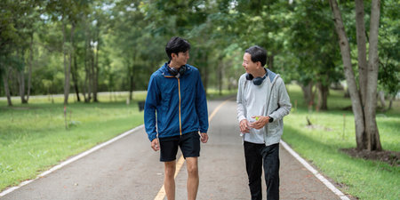 Father and Son Walking Together, Promoting Wellness and Connection