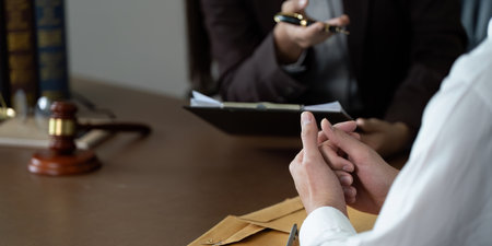 Legal Meeting. Lawyer presenting case details to client.