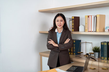 Confident Lawyer Standing in Modern Officeの写真素材