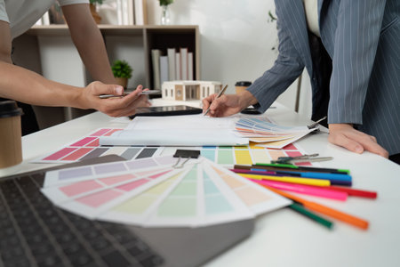 Creative Team Discussing Color Options for Design Projectの写真素材