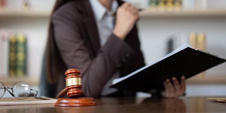 Legal Professional. Close-up of a lawyer preparing for a consultation with a client.