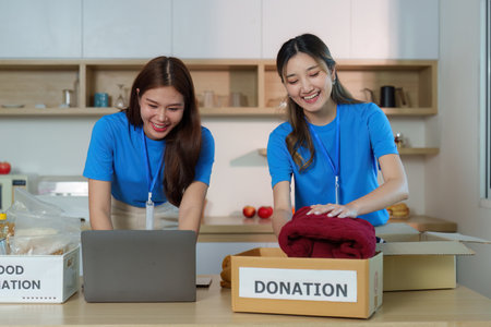 Donation Drive. Volunteers packing items for community support and charity.