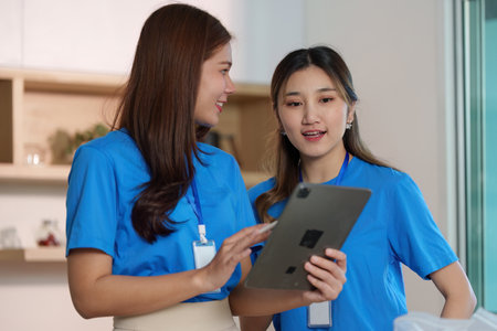 Food Donation Project. Volunteers discussing items for community support.の写真素材