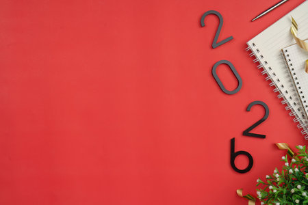 New Year 2026 background with decorative elements and notebookの写真素材