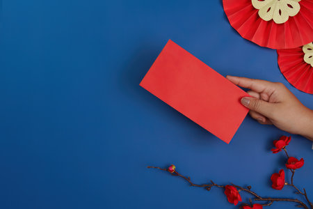 Red Envelope for Chinese New Year on Blue Backgroundの写真素材