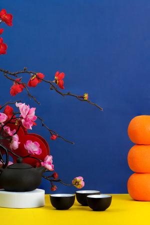 Lunar New Year background with tea set and decorative elementsの写真素材