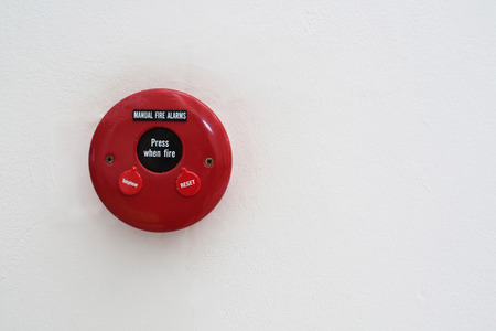 manual fire alarm on white backgroundの写真素材