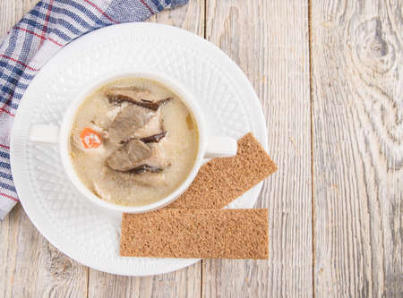 Chicken cheese soup with porcini mushrooms. Dish of Russian cuisine. Copy spaceの写真素材