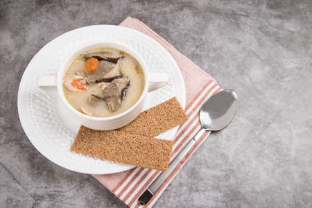 Chicken cheese soup with mushrooms. Home-cooked food concept.の写真素材