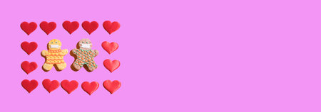 Banner with a couple in love in protective masks with hearts on pink