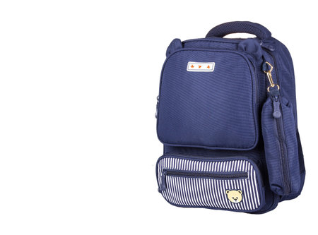 A lilac-colored school backpack with school supplies on a white background.