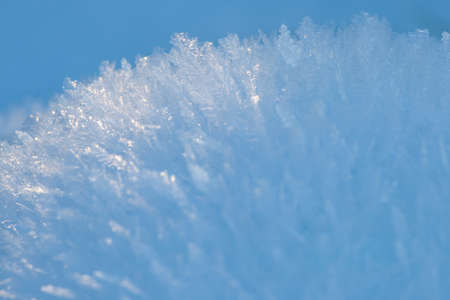 Background with frost crystals in sunlight