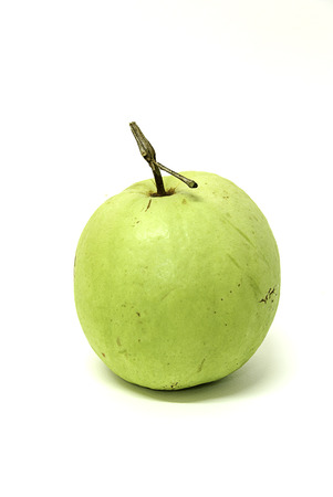 Single Guava on white background, fruit with green colorの写真素材