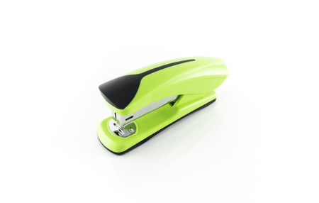 Green Stapler isolated on whiteの写真素材