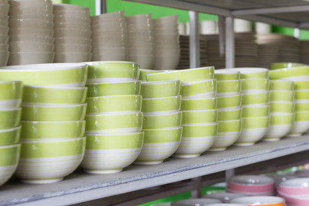 A lot of colorful bowls in a shopの写真素材