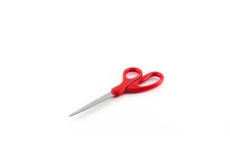 Red scissors isolated on whiteの写真素材